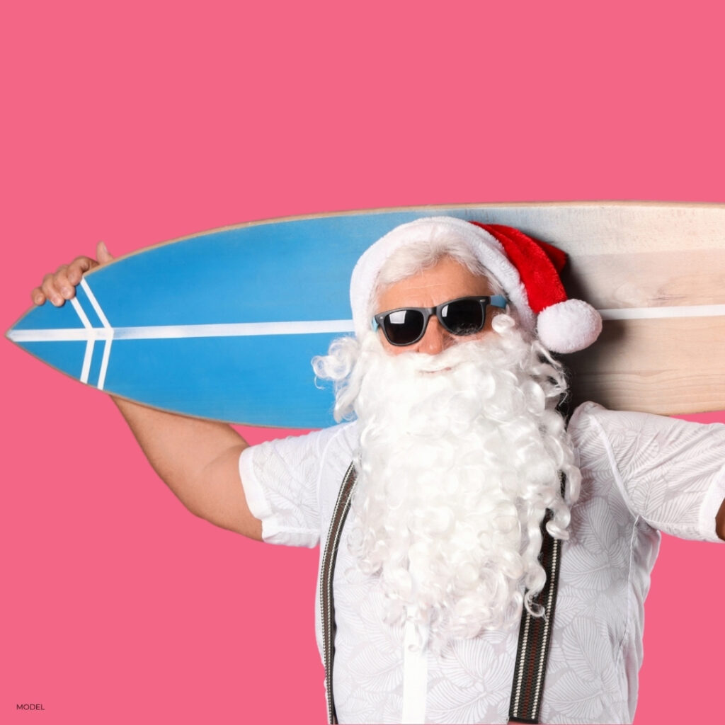 surfing santa to represent summer daxxify promotion
